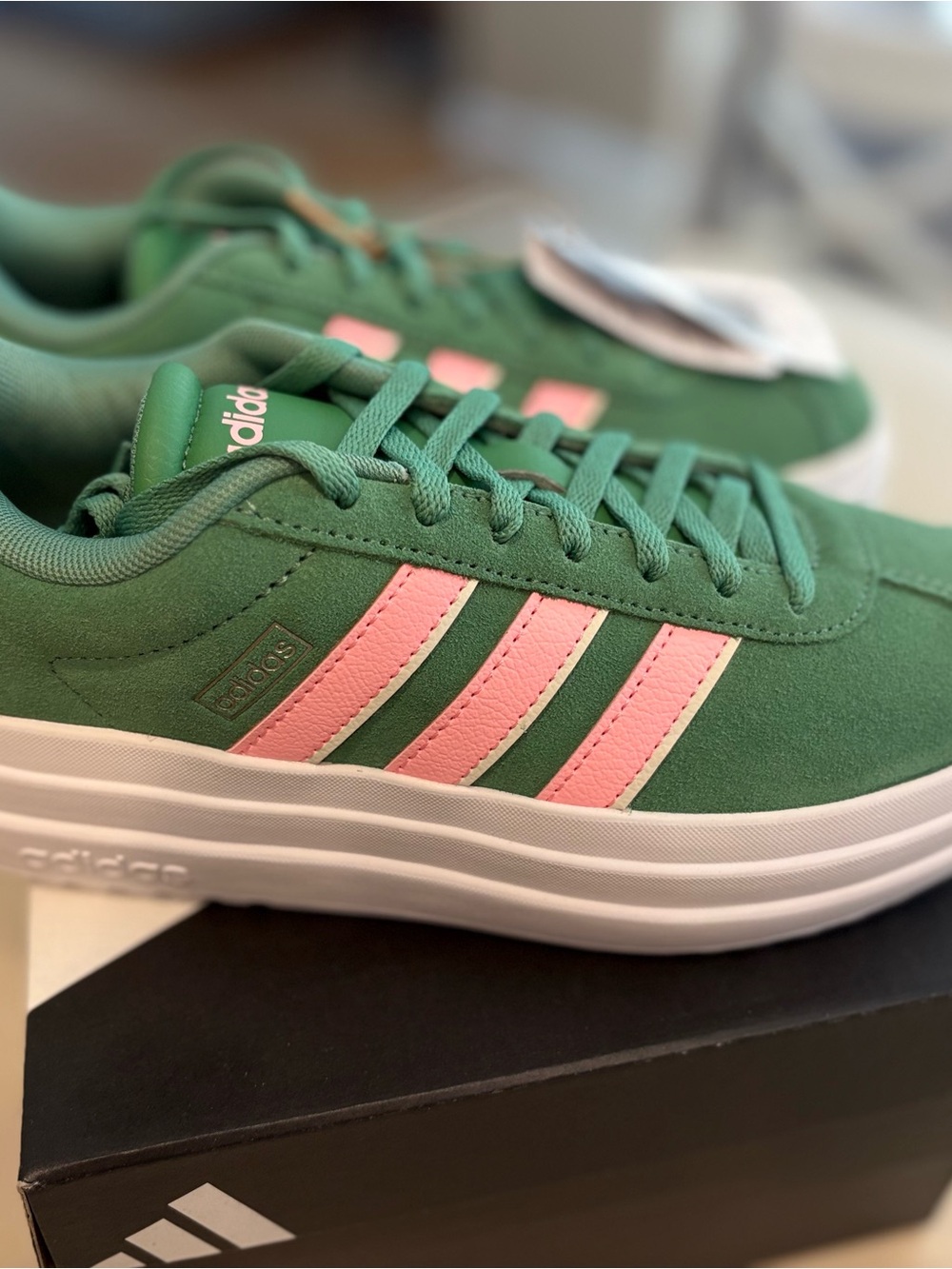 Brand new adidas Women's Green platform Sneakers with Pink Stripes.